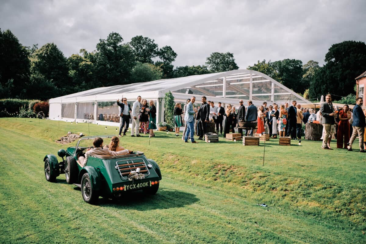 Warwick Wedding with car driving by